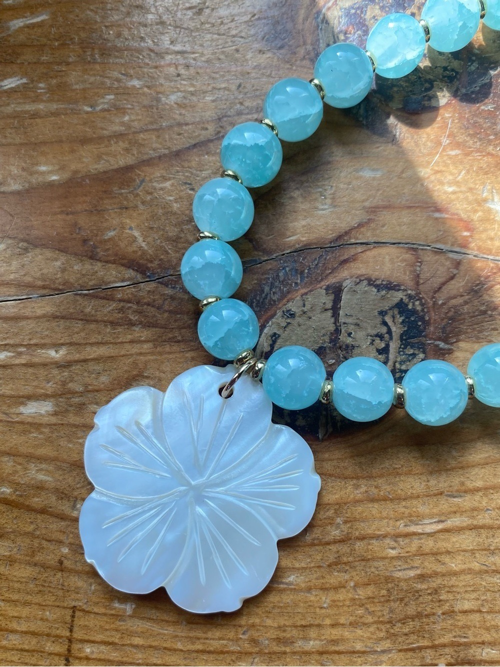 Hand Crafted mint Bead Necklace with White Carved plumeria Flower Pendant